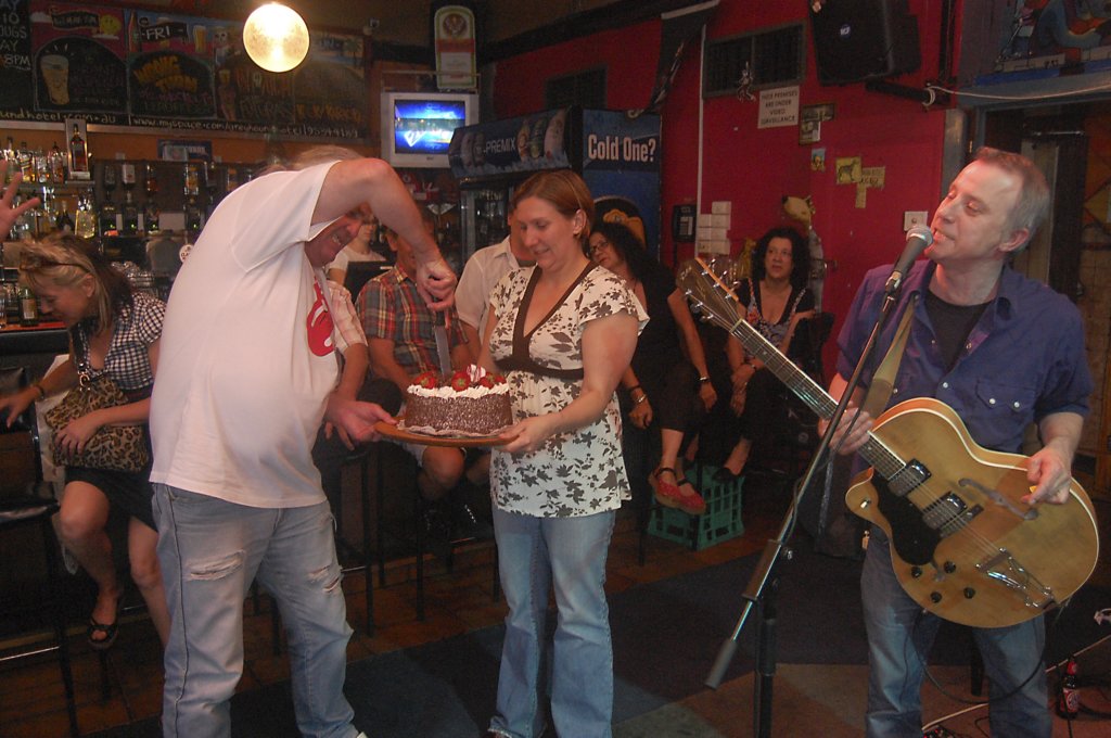 Keith cutting his cake