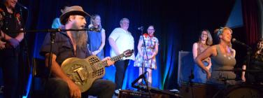 Hat Fitz and Cara with choir at the Caravan Music Club 25/01/26
