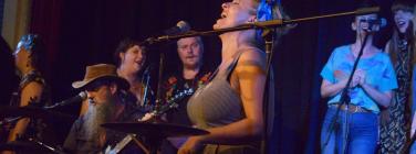 Hat Fitz and Cara with choir at the Caravan Music Club 25/01/26